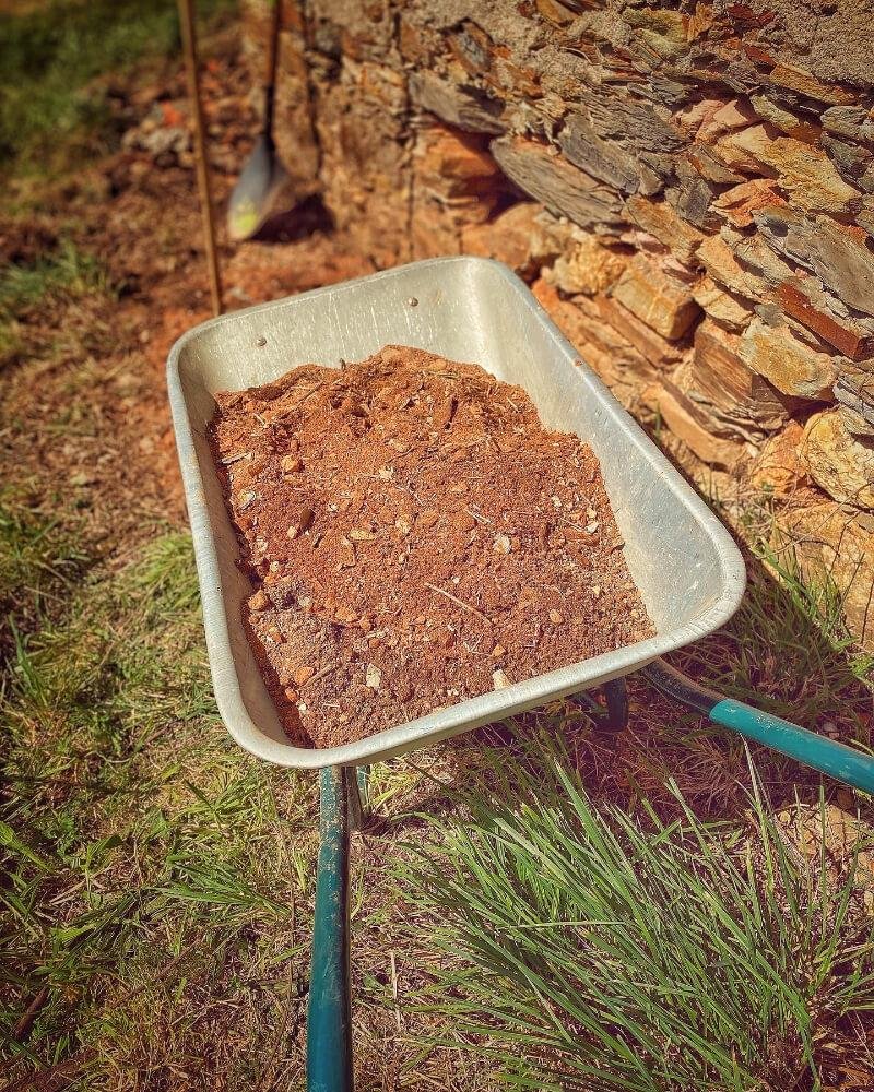 Earth Moving - Wheel barrow full of earth