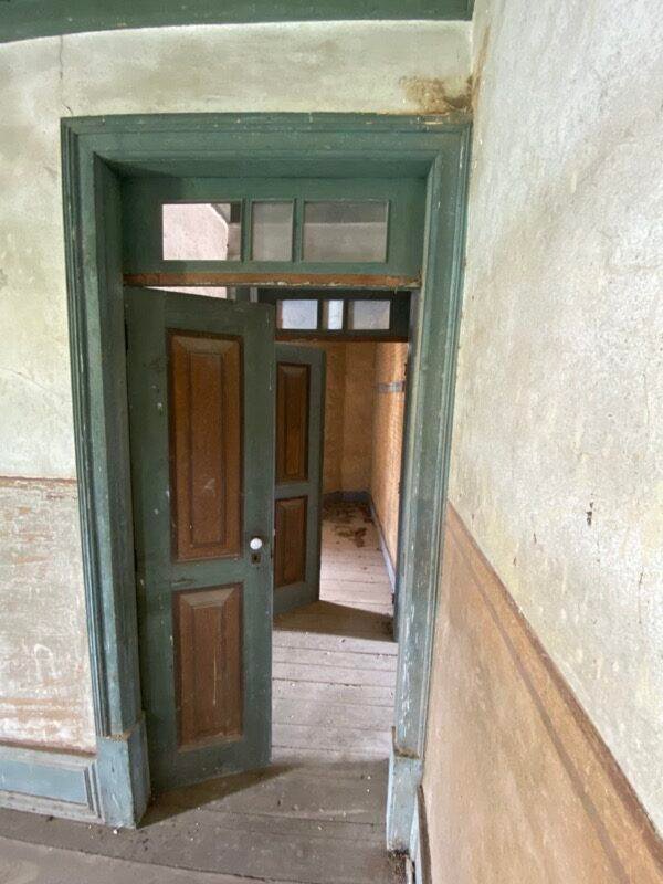 Doors leading the the main bedroom area