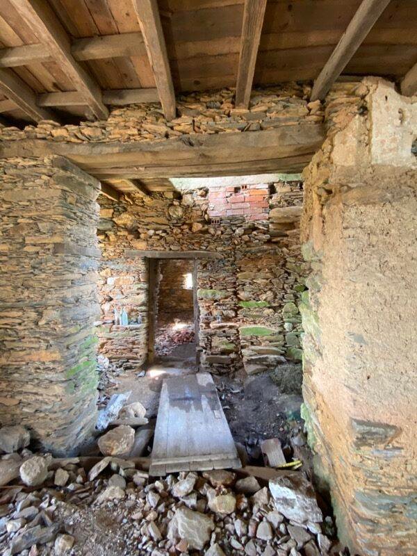 View of the stonework in the adega, looking towards the main hall