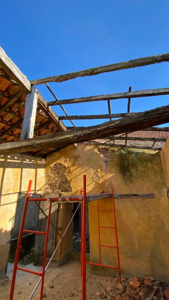 Clearing the new kitchen roof tiles and timbers