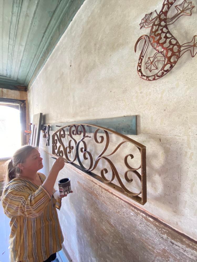 Clearning the iron work on the entrance doors