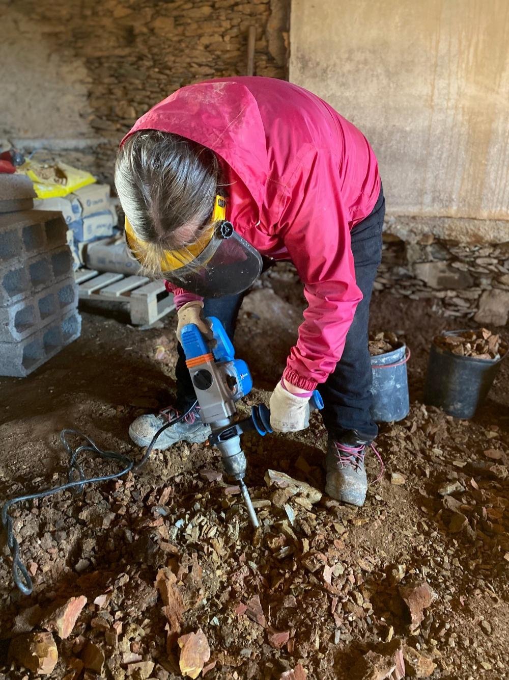 Julie clearing the way for laying our first limecrete floor Julie clearing the way for laying our first limecrete floor