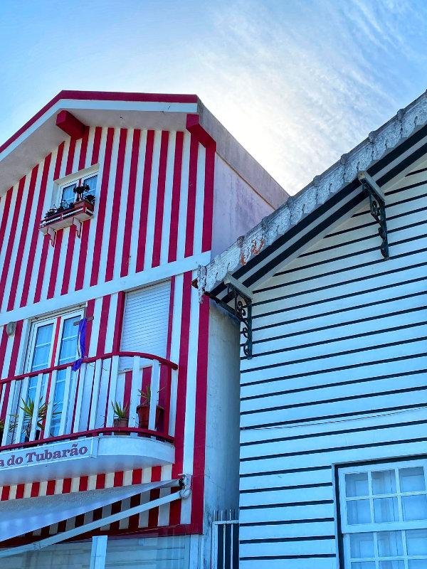 Red and Blue striped Palheiros in Costa Nova