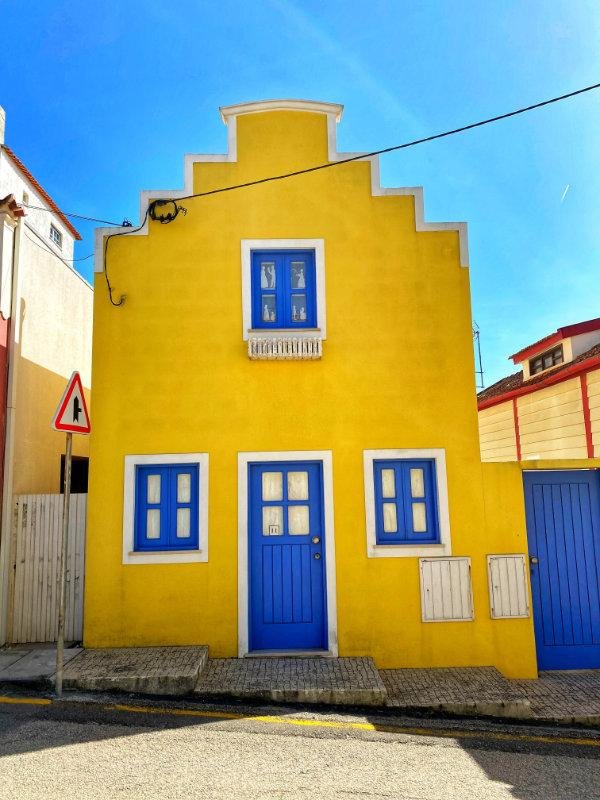 Yellow and blue house in Costa Nova, Portugal.